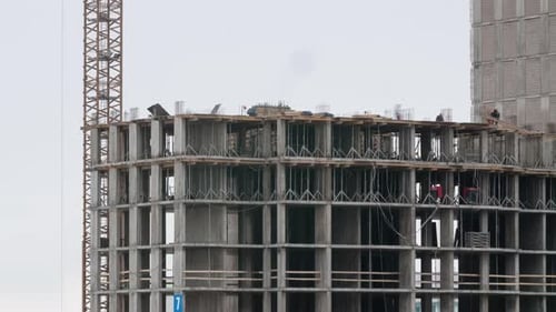 Crane on Construction Site Residential Estate Building in City Constructors Working Cloudy Day