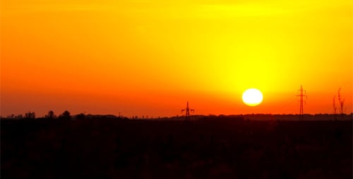 Sun Rises Over Rural Landscape in Time Lapse