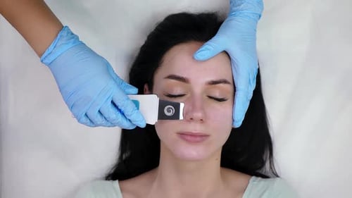 Woman Receiving a Facial Treatment for Skin Care
