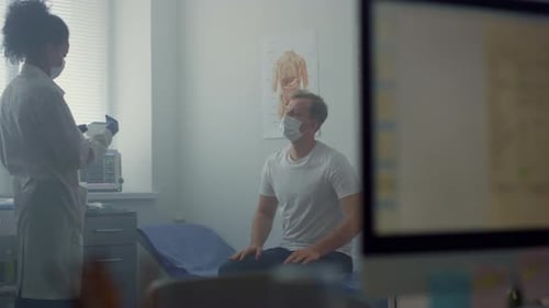 Physician Woman Discussing Disease Symptoms Patient Sitting Hospital Office