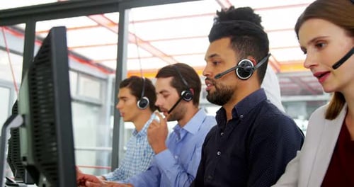Customer Service Team Working in Modern Call Center