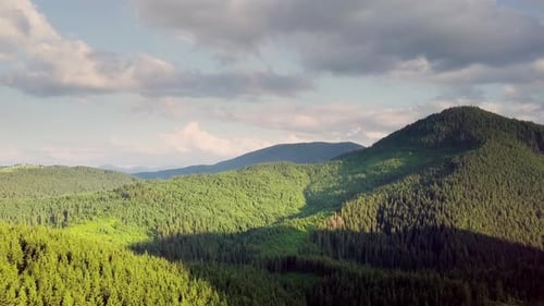 Mountain Peaks and Morning Sky with Smooth Moving Clouds