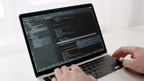 Coding on the Screen HTML Encoding and Programming on a Laptop Screen Developer Web Development