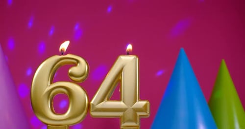 Gold Candles Burning for 64th Birthday Celebration
