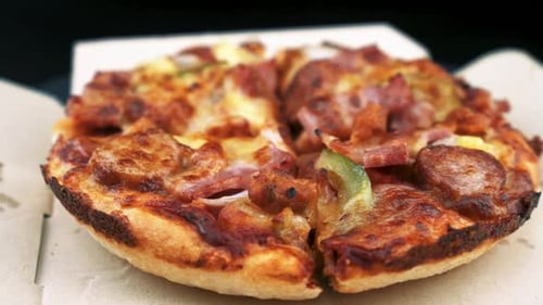 Close-Up of Fresh Pizza in Delivery Box