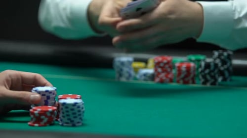 Poker Chips and Cards on a Gambling Table