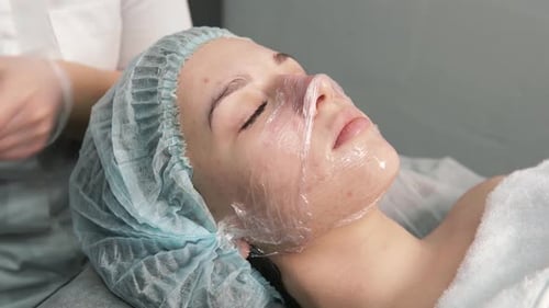 Facial Treatment with Plastic Wrap at Spa