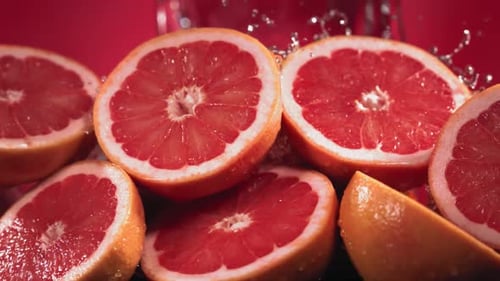 Close up of Grapefruit Being Splashed with Water