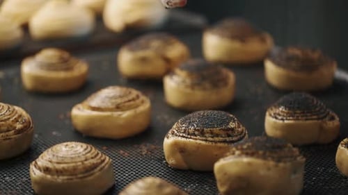 Sprinkling Freshly Baked Sweet Buns