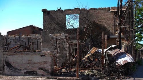 Wide Shot Ruins of Bombed House in Sunshine Outdoors