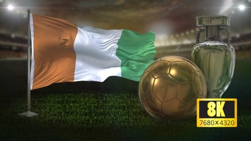Ivory Coast Flag Waving with Gold Soccer Ball and Silver Trophy