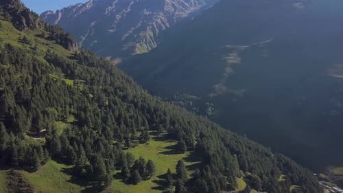 Valley in mountains with rocky slope
