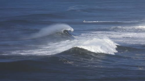 Large Wave Rolling on Surface of Stormy Ocean