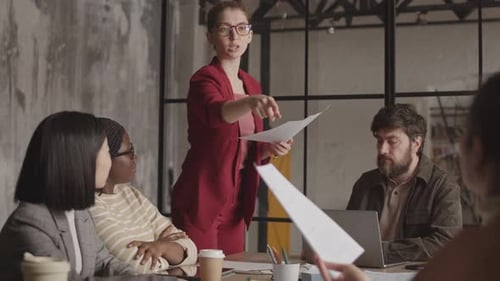 Office Worker Speaking at Business Meeting