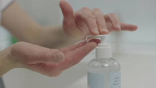 Applying Hand Sanitizer for Health and Hygiene