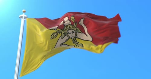 Waving Sicily Flag on Pole Against Blue Sky