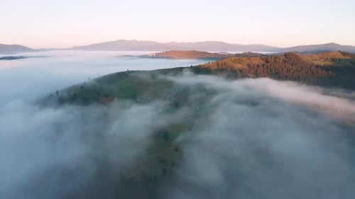 Aerial View of Foggy Sunrise in the Mountains