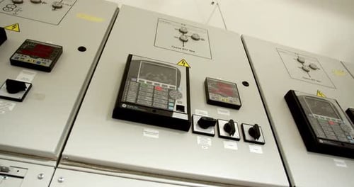 Control Panel at the Factory with Displays and Tumblers