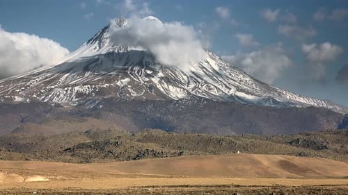 Snowy Volcanic High Altitude Mountain Cone