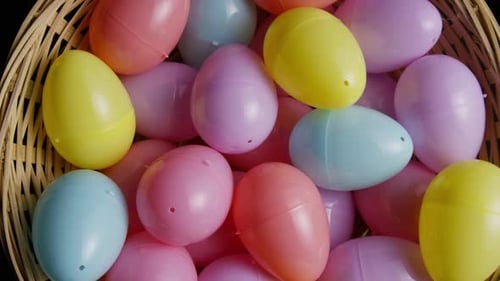 Brightly Colored Easter Eggs in a Wicker Basket