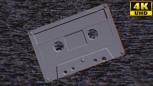 Rotating Cassette Tape with Retro Glitch Video Background