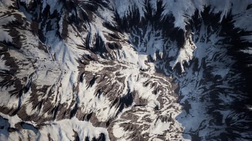 Aerial View of Snow Mountain Range Landscape
