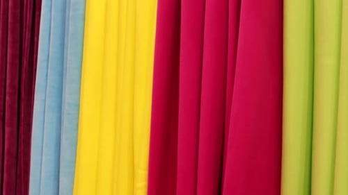Colorful Fabrics Hanging in a Row