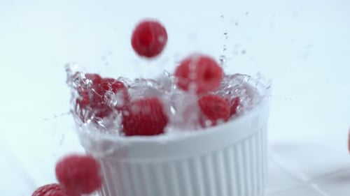 Raspberries splashing in slow motion; shot on Phantom Flex 4K at 1000 fps