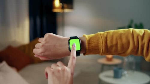 Woman Using Smartwatch with Chroma Key Closeup