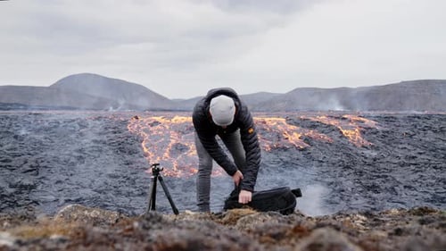 Photographer Prepares Camera to Film Volcanic Eruption