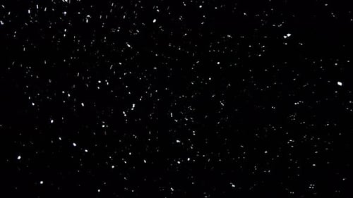 Sparkling Snow Falling on Black Background