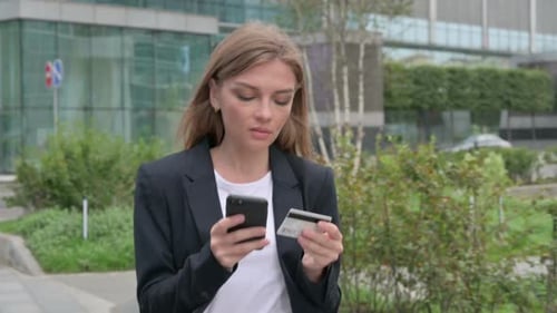 Businesswoman Making Online Payment on Smartphone