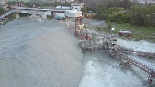 Rubble Barrow at Old Mining Sector Machines Against Forest
