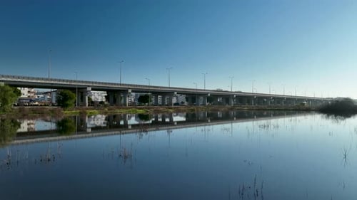 Traffic in the reflection of water aerial view 4 K