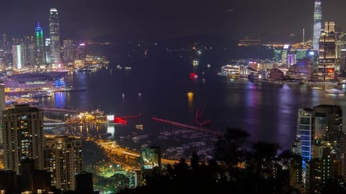 Hong Kong Urban Cityscape Aerial Skyline Panorama Zeitraffer bei Nacht Pan Up