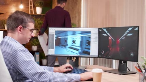 Game Designer Developing Graphics for New Game
