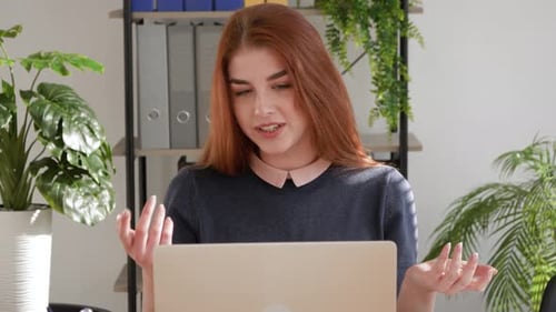 Young Woman Communicating via Webcam During the Day