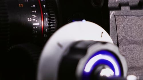 Film Camera Focus Puller Adjusting the Lens