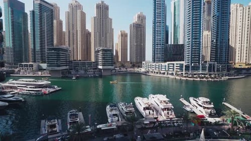 Panoramic View of Dubai Marina Skyline. Promenade and Canal in Dubai Marina with Luxury Skyscrapers