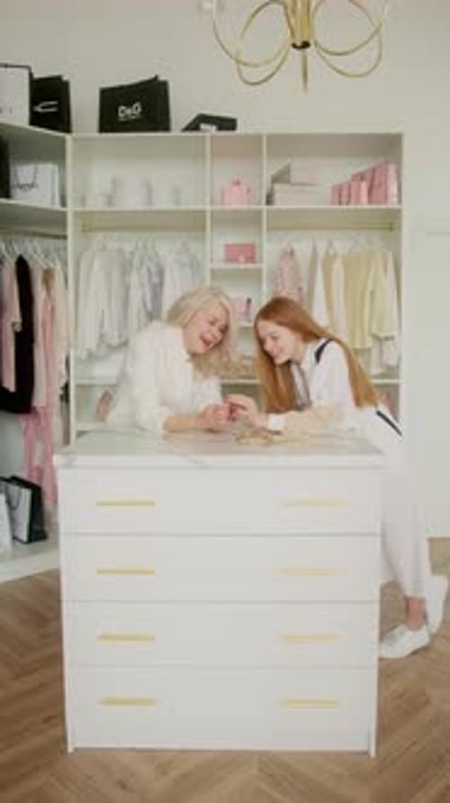 Two Stylish Women Chatting in Closet