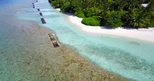 Beautiful overhead abstract view of a sunshine white sandy paradise beach and blue water background