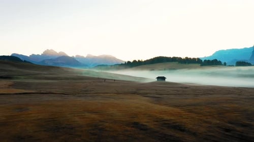 Autumn Morning and Bright Misty Sunrise in the Valley of Compaccio. Province of Bolzano, Italian