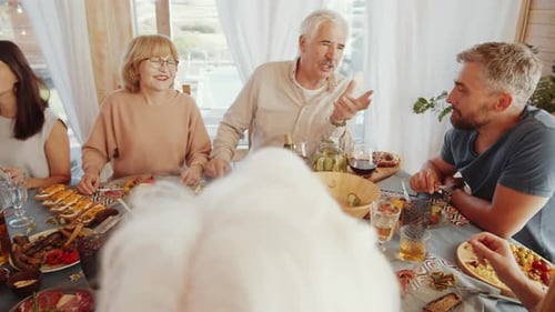 Family Gathering for Festive Meal Indoors