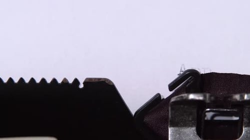 Word Application on a Sheet Printed Retro Machine. Close Up