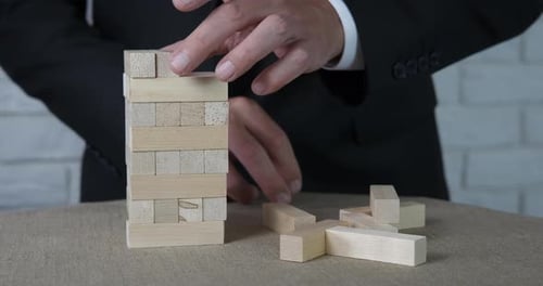 Wooden Blocks Tower Assembled on Table