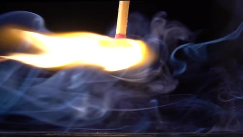 Match Ignites with Vivid Flame and Smoke