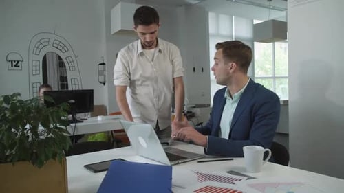 Young Man Entrepreneur Coming To the Office Tax Advisor for Consultation.