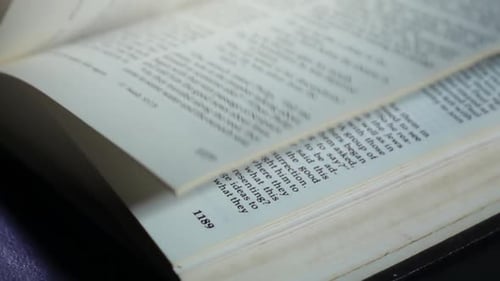 Open Bible Pages with Religious Text