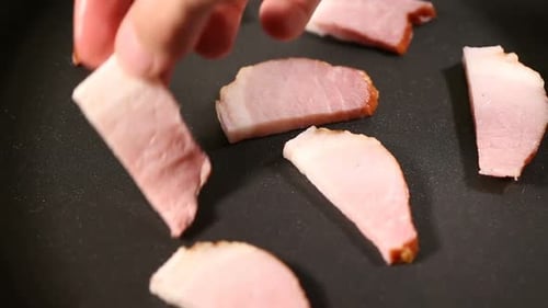 Slices of Uncured Ham Placed on Pan