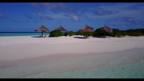Aerial view panorama of tropical shore beach voyage by blue green ocean and white sand background of